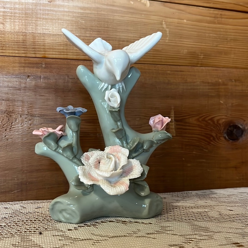 Porcelain Bird on a Branch with Flowers